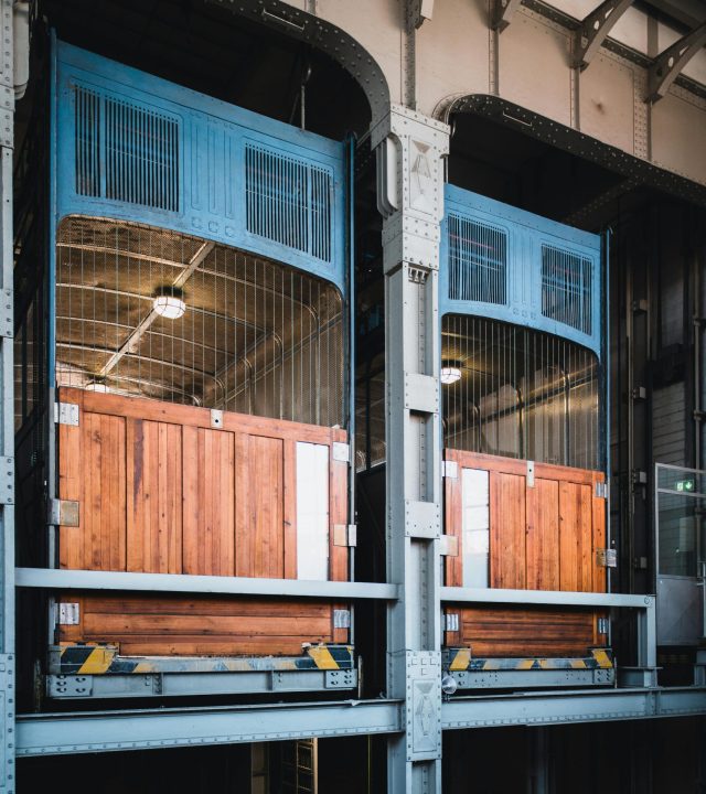 Intricate design of historic wooden lifts in Hamburg's Old Elbe Tunnel.